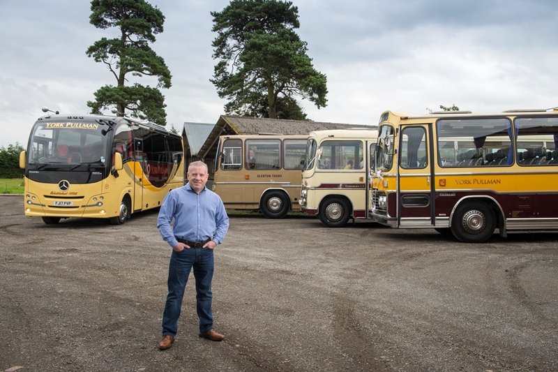 Managing Director Tom James and Pullman Coaches, old and new.